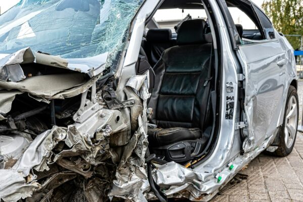 damaged-vehicle-closeup-after-a-heavy-crash-traffic-accident-insurance-concept.jpg